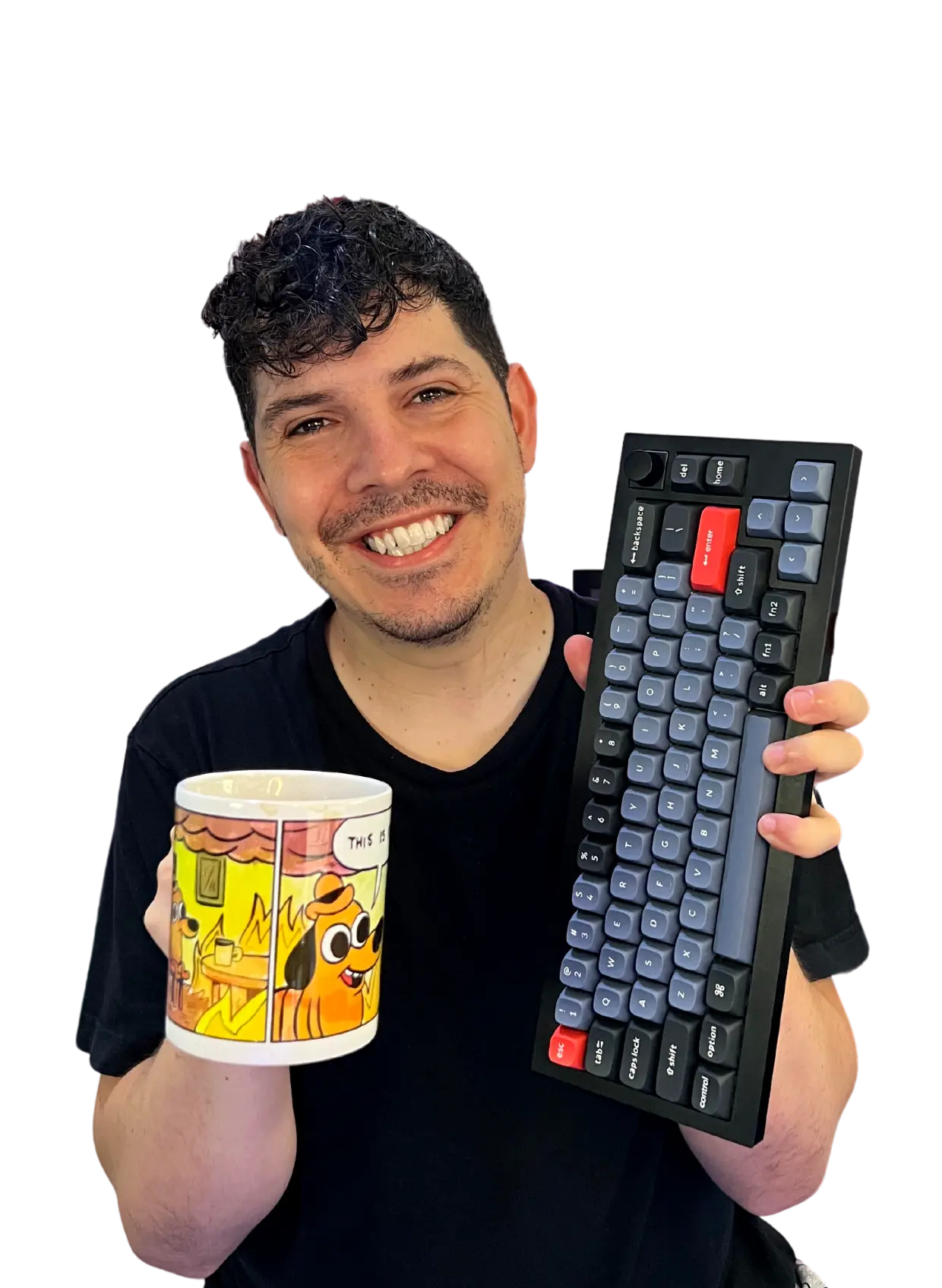 Fotografía de midudev sujetando una taza y un teclado